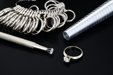 Diamond and Jewelry Ring With Tools
