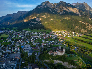 Fototapeta na wymiar Aerial view around the city Balzers in Lichtenstein on a sunny afternoon in summer.