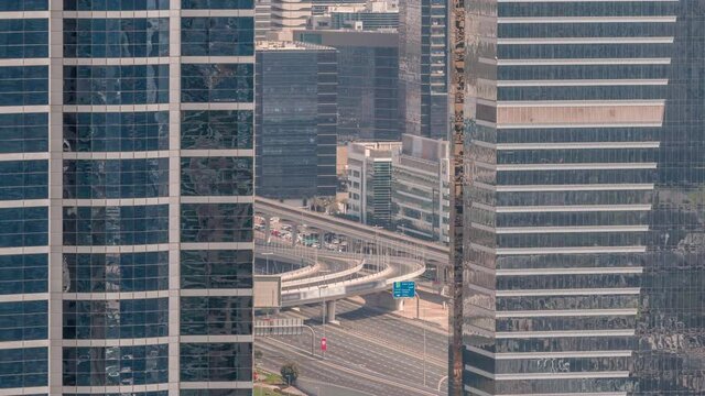 Aerial view of media city and al barsha heights district area timelapse from Dubai marina.