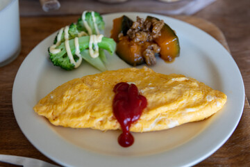 Omelette for breakfast. Broccoli and pumpkin aside.