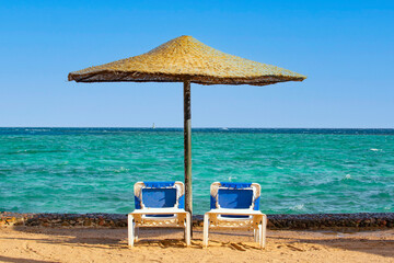 HURGHADA, EGYPT - September 22, 2021 : tourist boats on the Red Sea in sunny day, view from the sea.