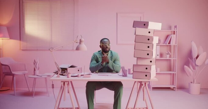 Unhappy tired exhausted man burned out work overworking alone extra hours job routine. Pink office monochrome design Overthinking about bad news and fatal mistake desition of investment. Loneliness