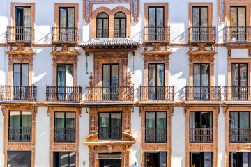 Fototapeta na wymiar Facade of tenement house in Seville, Andalusia, Spain