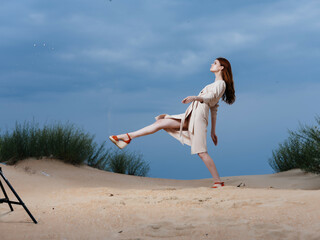 attractive woman in coat posing beach fresh air model Travel
