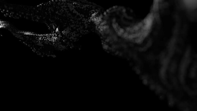 plastic melting on black background 4k footage