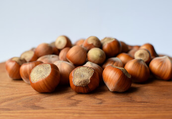 Hazelnuts on a wooden background. Hazelnuts in shell, healthy food