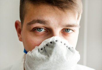 Young Man in Flu Mask