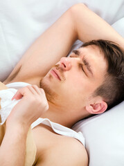 Fototapeta na wymiar Young Man sleeping