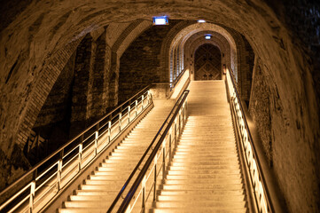 Staircase in deep and long undergrounds caves for making champagne sparkling wine from chardonnay...