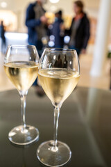 Tasting of brut champagne sparkling wine during visit caves in champagne house in Reims, France