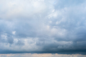 Naklejka na ściany i meble Cloudy sky with rain clouds, background