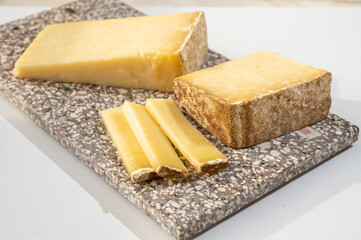 Cheese collection, hard French cheese old cantal made from raw cow milk with rind