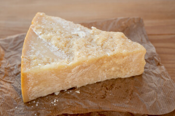Cheese collection, piece of matured cow cheese pasmesan parmigiano reggiano made from cow milk