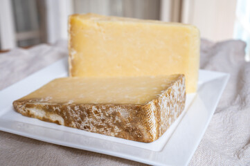 Cheese collection, hard French cheese old cantal made from raw cow milk with rind