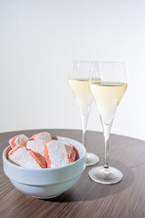 Symbols of Reims - glasses with brut champagne and rose biscuits