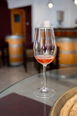 Wine industry of Cyprus island, tasting of rose dry wine on winery located on south slopes of Troodos mountain range.
