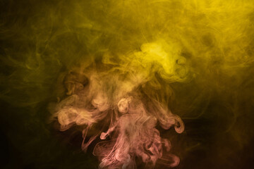 Yellow and pink steam on a black background.