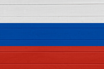 Russian flag on wooden textured background. Copy space, text place. Backdrop. Wood finish material....