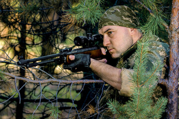  young man with an air rifle