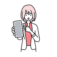 立ってスマートフォンを指差してこちらに向けて見せているジャケットの女性