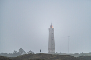 Fototapeta na wymiar lighthouse on the coast, blavandshuk fyr