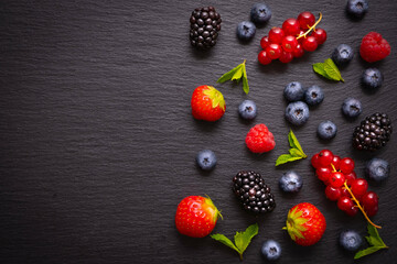 ripe berry - raspberries, red currants, blueberries, strawberries, hedgehogs and mint leaves