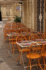 Italy, Salento: Chairs and Tables of Restaurant Street.