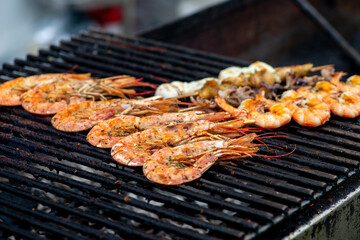 Grilled prawns, seafood and langoustines. BBQ with seafood