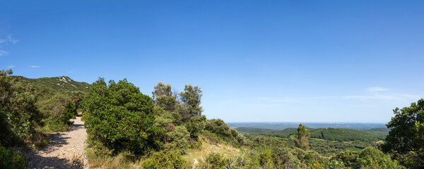 Hiking trail to the summit of Pic Saint Loup, the emblematic mountain of the French city of...