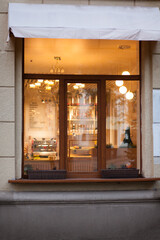 Cafe windows in the evening, where there are no visitors.