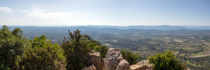 Fototapeta na wymiar Rural landscape view on the valley of Pic Saint-Loup mountain in Languedoc-Roussillon, France
