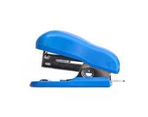Small blue stapler for stapling paper isolated on white background