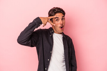 Young mixed race man isolated on white background dancing and having fun.