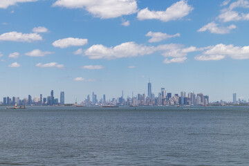 The New York City Skyline in the Distance seen from St. George on Staten Island along New York Harbor