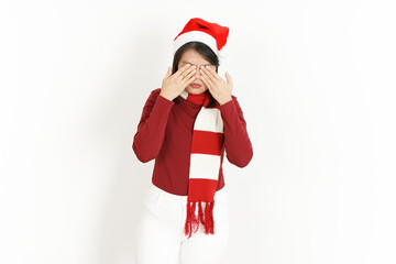 Covering eyes of Beautiful Asian Woman Wearing Red Turtleneck and Santa Hat Isolated On White Background