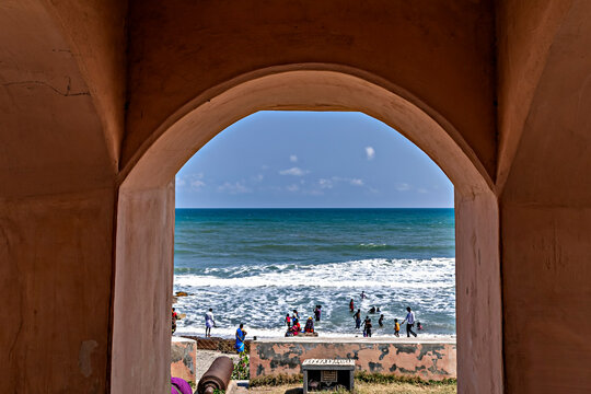 View of the tourists enjoying sea through window of fort Dansbor