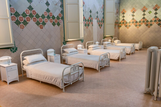 Barcelona, Spain - September 19, 2021: Ancient hospital patients room in Sant Pau hospital in Barcelona with beds