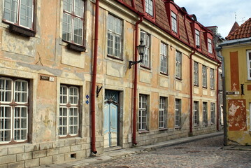 Fototapeta na wymiar Building with a blue door in the Old Town, Tallinn, Estonia