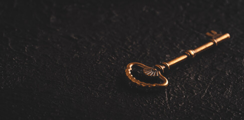Vintage key on black  