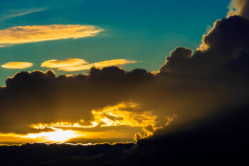 Beautiful bright sunset. Panoranic Sunrise Sky with colorful clouds