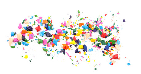 Colorful graphite crumbs on white background. Pencil sharpening