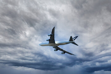Fototapeta na wymiar airplane in the sky/clouds