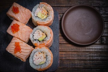 Fototapeta na wymiar Sushi- delicious asian. Fastfood- restaurant concept