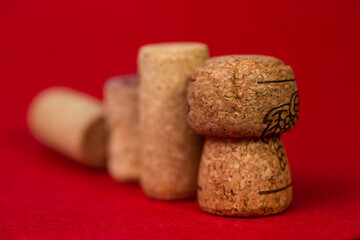 wine corks close up on a red background