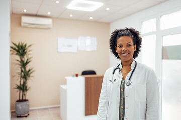 Portrait of a positive doctor at private practice medical clinic.