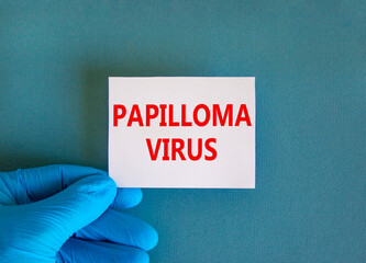 Papilloma virus symbol. White note with words Papilloma virus, beautiful blue background, doctor...