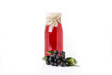 Aronia Chokeberry Juice In Glass Bottles And Fresh Berries Isolated On White Background. Side View.