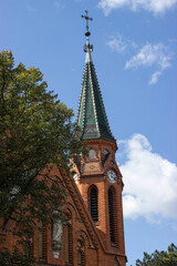 Detail of the tower of red church in Postorna