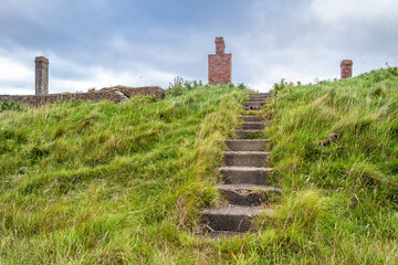The ruins of Lenan Head fort at the north coast of County Donegal, Ireland.