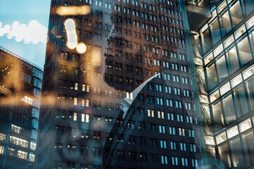 Double exposure of businessman and office building